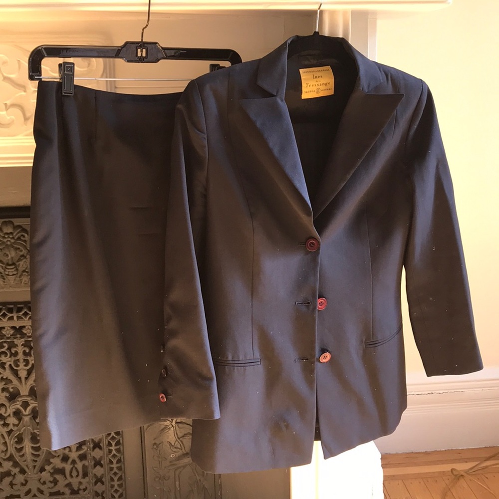 Woman’s designer suit jacket and skirt